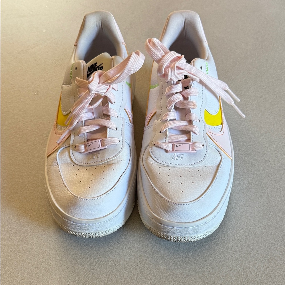 Nike Air Force One White Sneakers with Yellow and Pink Accents